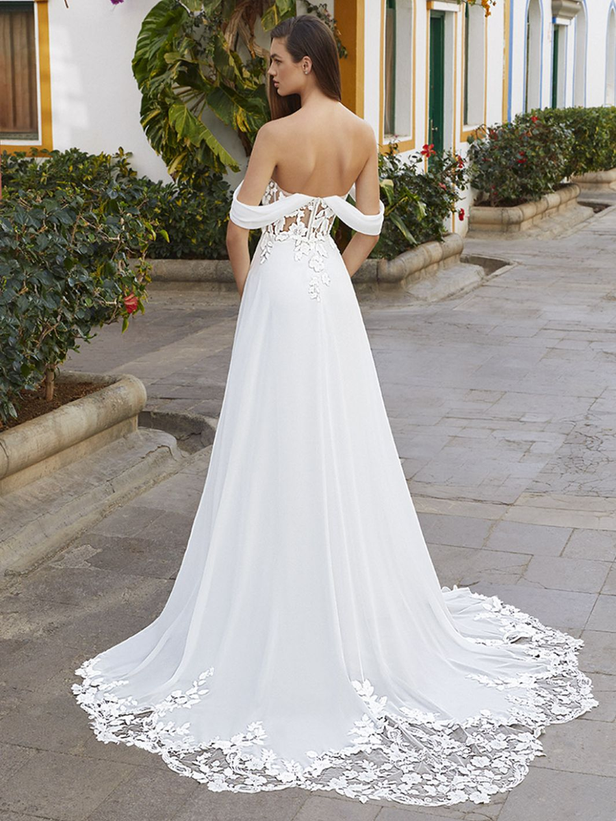 Love wedding gown at Whimsical Bridal