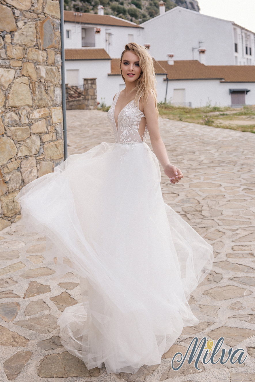 Milva wedding gown at Whimsical Bridal