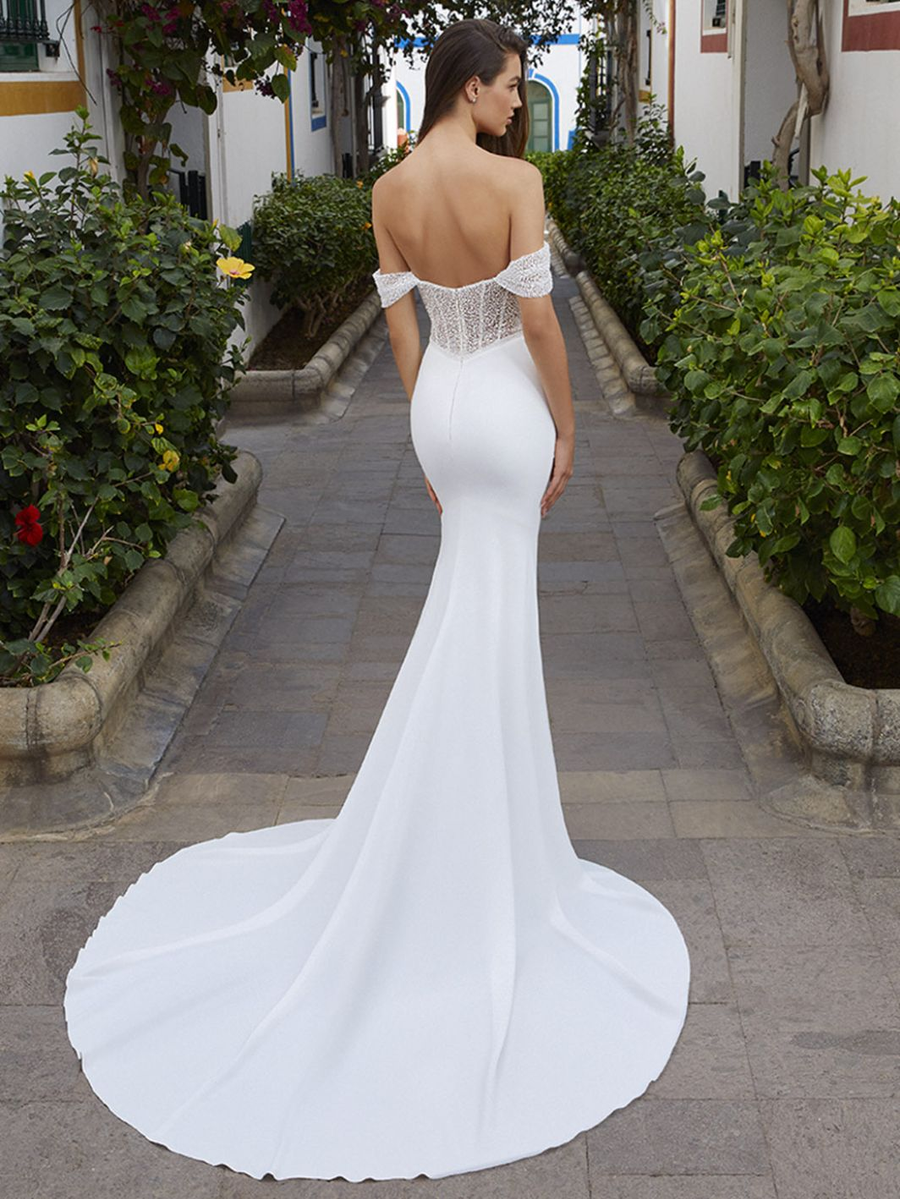 Love wedding gown at Whimsical Bridal