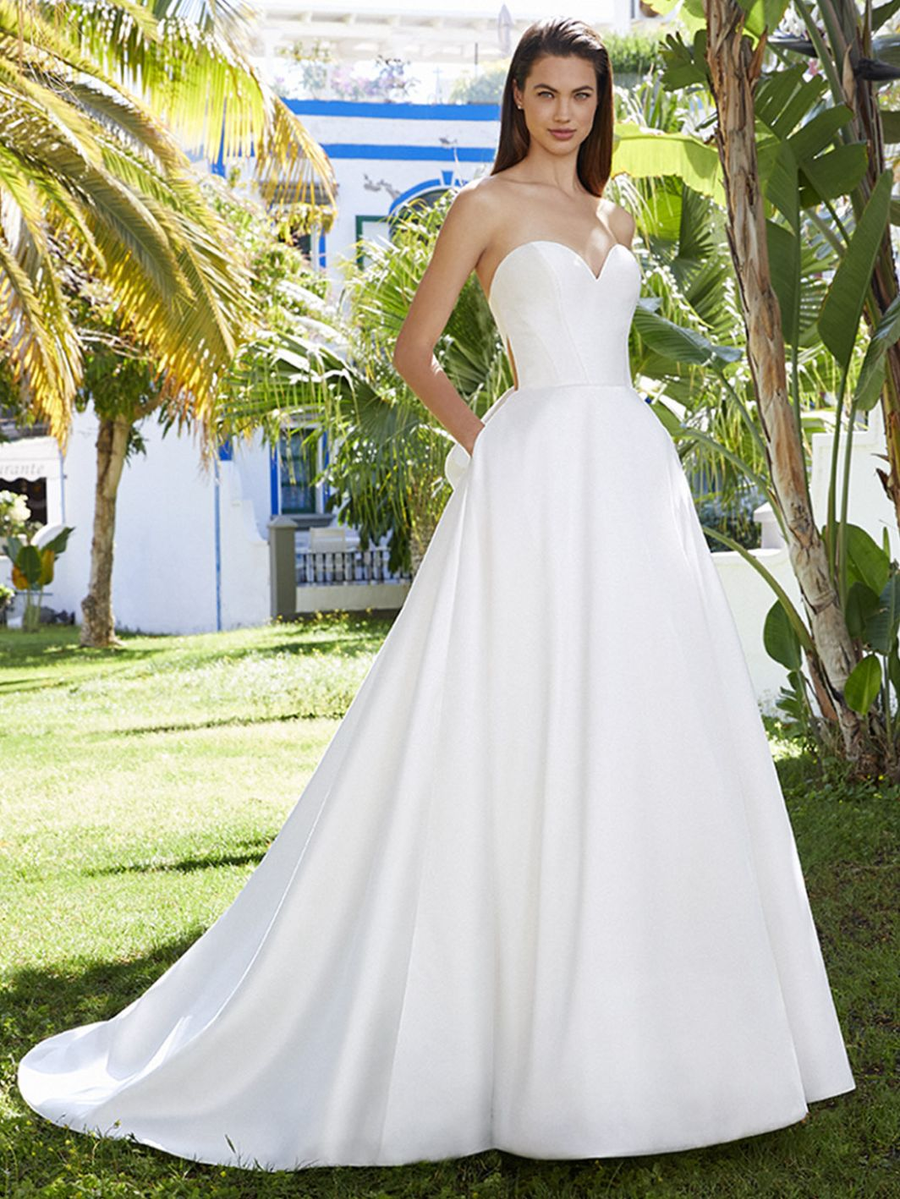 Love wedding gown at Whimsical Bridal
